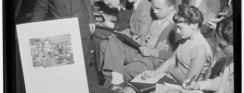 public domain photo from the Library of Congress (loc.gov) taken in 1947 With a jazz photo and seemingly an audience taking notes