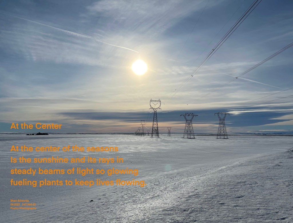 glowing sun over rolling snow-covered fields with power lines receding into the horizon beneath the sun