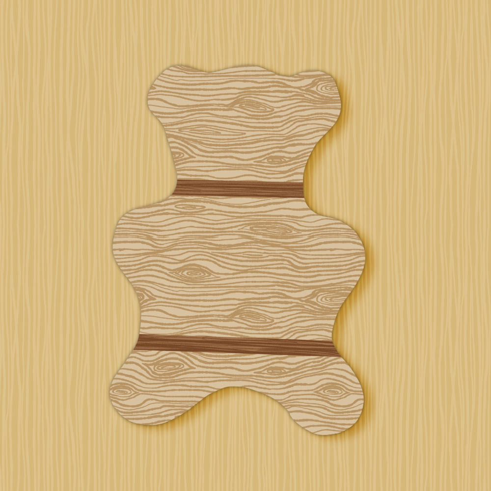 wooden kitchen wall decor and cutting board in shape of a bear haning on a tan striped wall